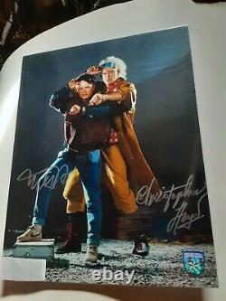 BACK TO THE FUTURE SIGNED(L)11X14 MICHAEL J FOX. //CHRISTOPHER LLOYD/With (COA)