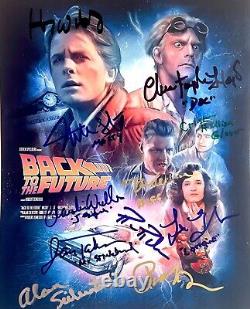 BACK TO THE FUTURE photo cast signed by MICHAEL J FOX CHRISTOPHER LLOYD ZEMECKIS