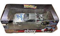 Christopher Lloyd Signed Back To The Future 124 Diecast Delorean Beckett