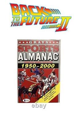 Christopher Lloyd Signed Back To The Future II Grays Sports Almanac (Beckett)