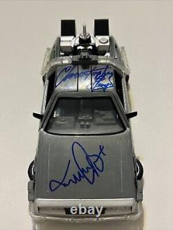 Michael J. Fox & Christopher Lloyd Signed Autographed Delorean Beckett BAS