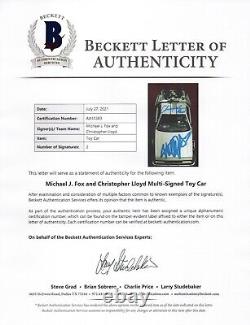 Michael J Fox Christopher Lloyd Signed BACK TO THE FUTURE 124 DeLorean BAS LOA