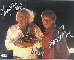 Michael J Fox and Christopher Lloyd Signed Back Future 11x14 Photo Beckett BAS